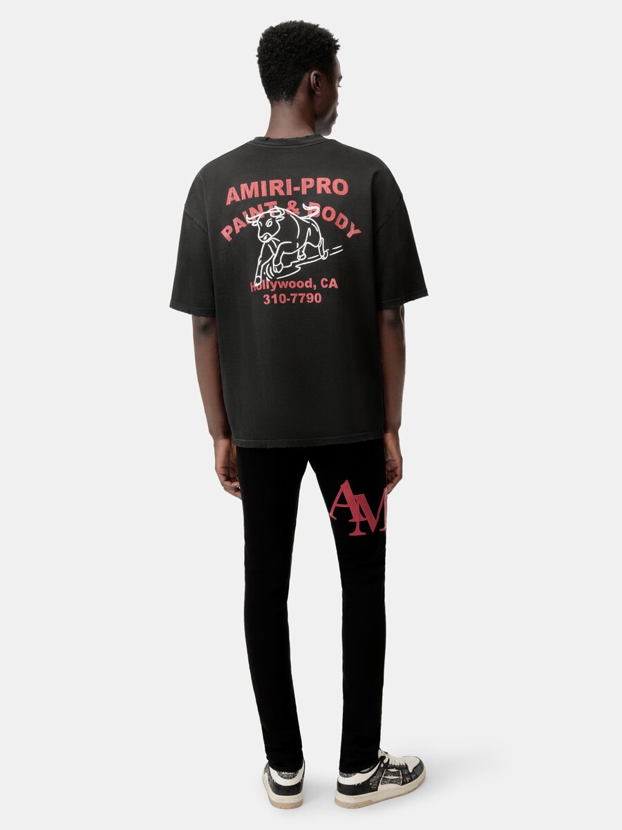 STAGGERED LOGO SKINNY JEAN- Black Red